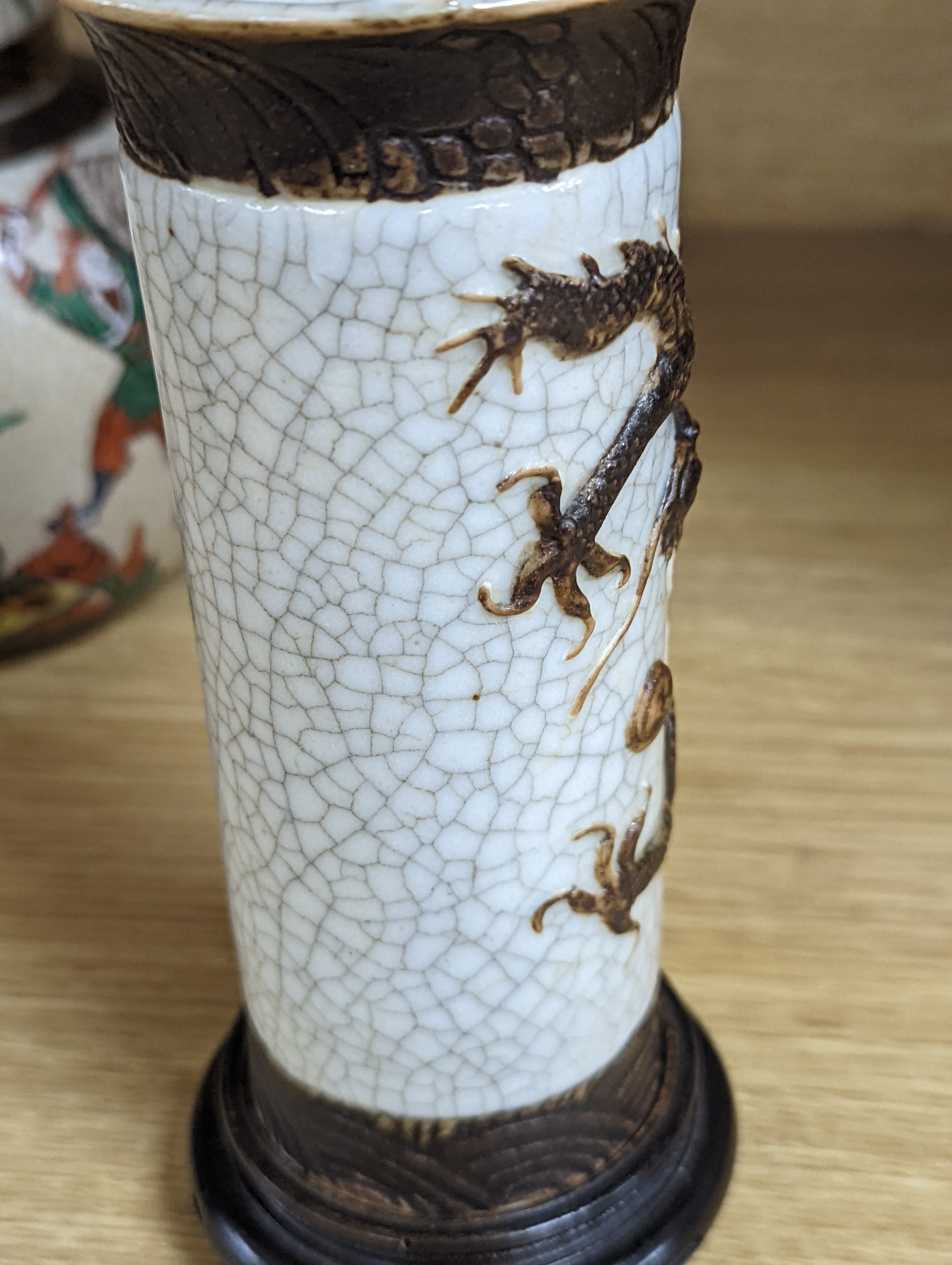 A Chinese famille verte crackle glaze jar and cover, 14.5cm, two famille rose dishes and a crackle glaze ‘dragon’ vase, all late 19th/early 20th century